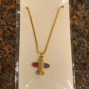 Gold and Rhinestone Airplane Necklace